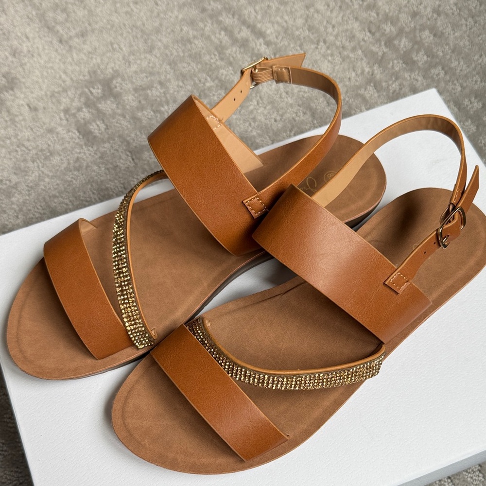 Elegant Brown Sandals with Gold Accents, size 8.5